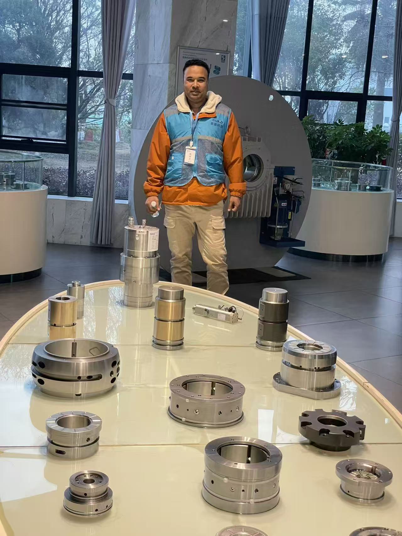 Industrial component display and product application showroom visit during manufacturer review for power plant project