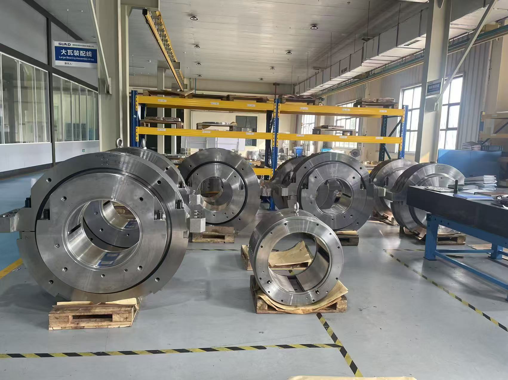 Large bearing assemblies staged for final review before dispatch for power plant export order